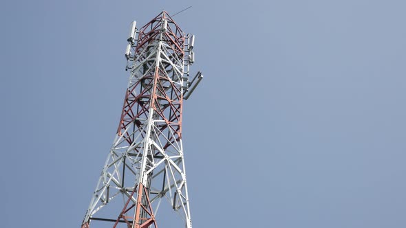 Antenna aerial system telecommunication repeater background 4K 3840X2160 UHD tilting footage - Outdo alt