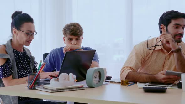 Group Meeting of Creative Business People Designer and Artist at Office Desk alt