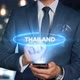 Businessman Smartphone Hologram Word Country   Capital   Thailand - VideoHive Item for Sale