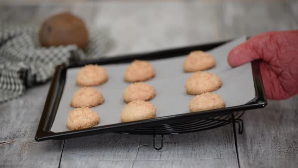 Coconut Cookies on a Baking Sheet From Oven