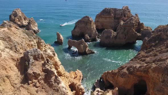 Aerial view of Ponta da Piedade rock formations in Lagos, Portugal alt