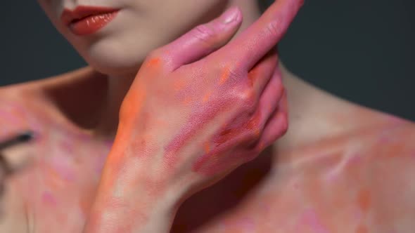 Body Makeup Applying. alt