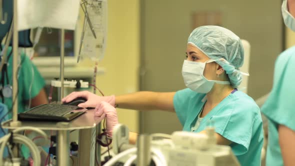 Assistant Helps the Surgeon During the Operation