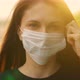 Young Beautiful Girl Takes Off Her Protective Mask and Smiles - VideoHive Item for Sale