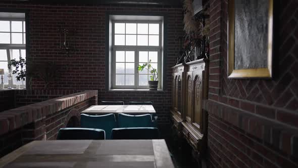 Live Camera Moves Along Tables in Oldfashioned Restaurant Indoors in Slow Motion alt