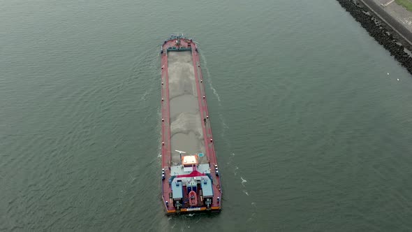 Aerial View of a Bulk Carrier Ship Moving Silt and Sand alt