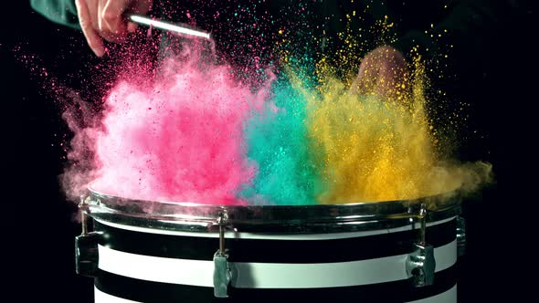 Super Slow Motion Shot of Drum Hit with Color Powder Explosion at 1000 Fps alt