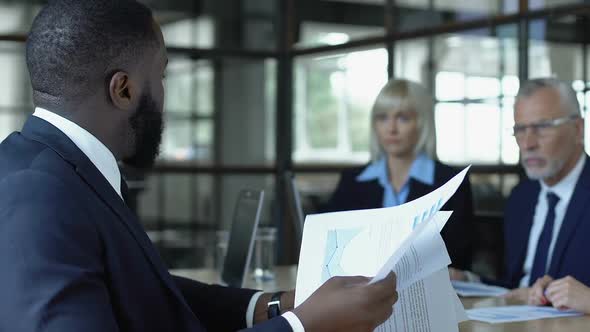 Angry Boss Throwing Papers, Scolding Employees for Missed Deadline, Bankruptcy alt