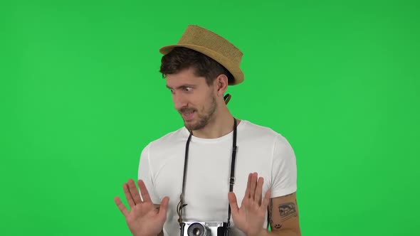 Portrait of Confident Guy Is Pointing Himself, Say Who Me No Thanks i Do Not Need. Green Screen alt