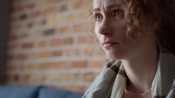 Caucasian woman consoled by unrecognizable person.  Shot with RED helium camera in 8K. alt