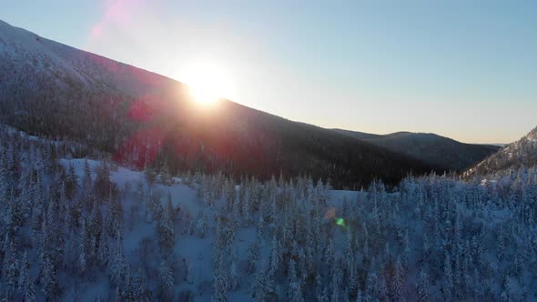 Winter aerial 4K sunrise in the Gaspesie mountains