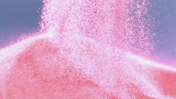 Pile of pink colored sand, Slow Motion alt