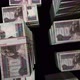 Flight over the Egyptian Pound money banknote packs loop - VideoHive Item for Sale