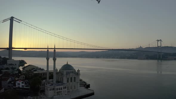 Ortakoy Mosque and Istanbul Bosphorus Bridge Aerial Video alt