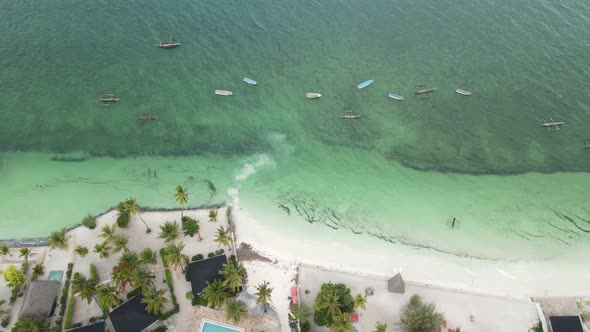 Coastal Landscape of Zanzibar Tanzania  Boats Near the Shore alt