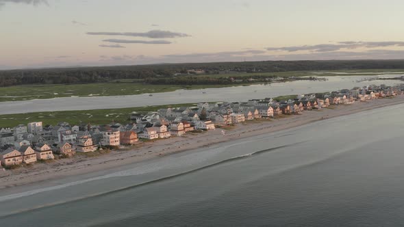 Wide aerial view Housing property along Wells Beach seaside shoreline, Maine alt