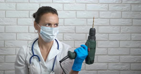 Dangerous doctor with drill.  alt