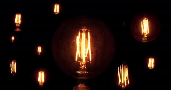 Edison Lamps Flicker At Night. Dirty Light Bulb Glass With Scratches Evokes Horror alt