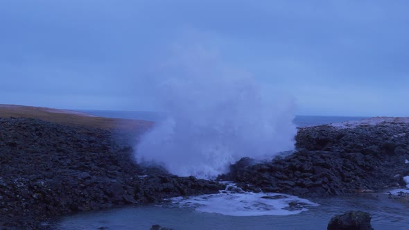 Iceland Ocean Water Erupting From Cave Blow Hole In Arnarstapi