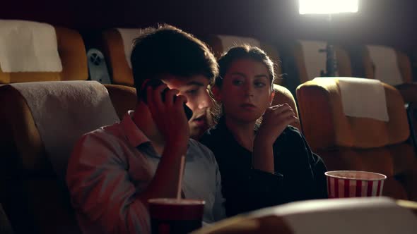 A Man Talking on a Mobile Phone alt