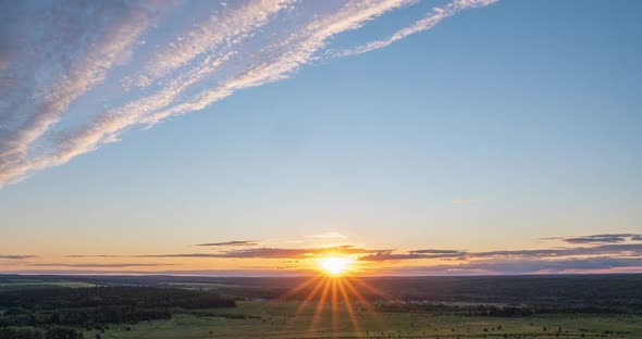 Aerial Scene of High Panoramic View at Sunset. Beautiful Clouds Blue Sky, Sun Glow Cloud, Background alt