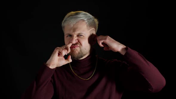 Funny Stupid Stylish Man Picking Nose and Ear Removing Boogers Uncultured Habit Bad Manners alt