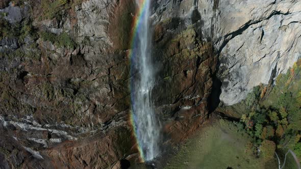 Aerial View of a Waterfall and Rainbow in the Village of Lauterbrunnen. Switzerland in the Fall