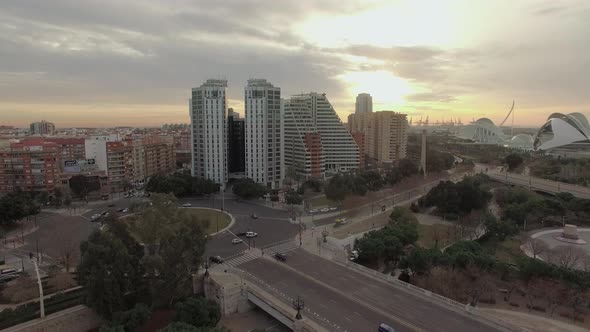 Flying Over Valencia at Sunset, Spain. Cityscape with Bridge and Buildings alt