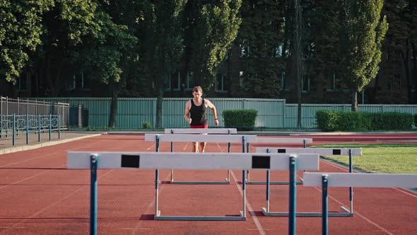 Professional Athlete Overcomes Obstacles By Jumping Over Them alt