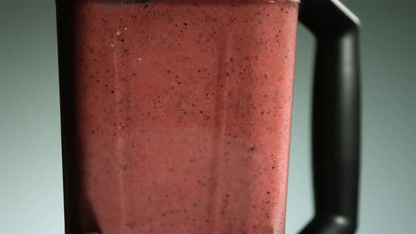 Fruit in blender in ultra slow motion  alt