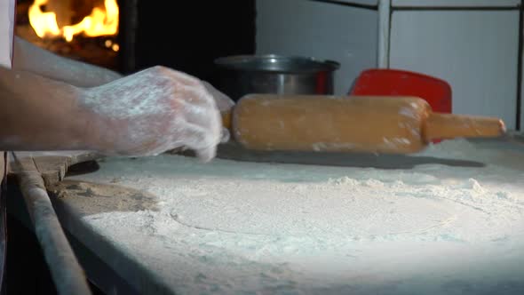 Baker Preparing Pita Dough