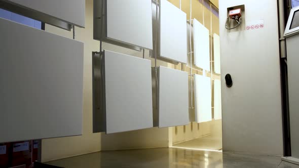 Industrial Painting Units. Industrial Painting of Parts From Spray Guns. Painting Parts in Workshop alt