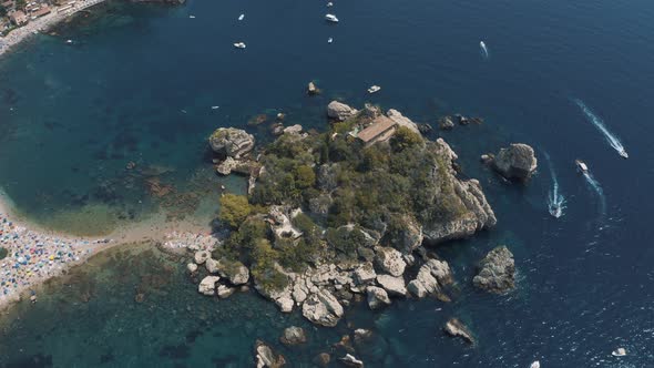 Aerial View of Isola Bella in Taormina in Island of Sicily Italy 4K