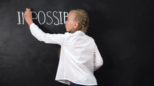 Smart Girl Standing Near Blackboard, Crossing IM in Word IMPOSSIBLE, Motivation alt