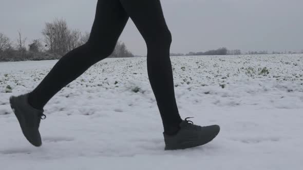 Running Legs on Snow Slow Motion