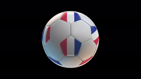 Soccer ball with flag France, on black background loop alpha