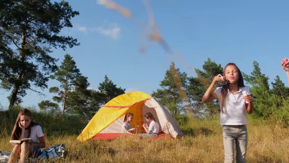 Children Spend Summer Vacations in a Tent Camp alt