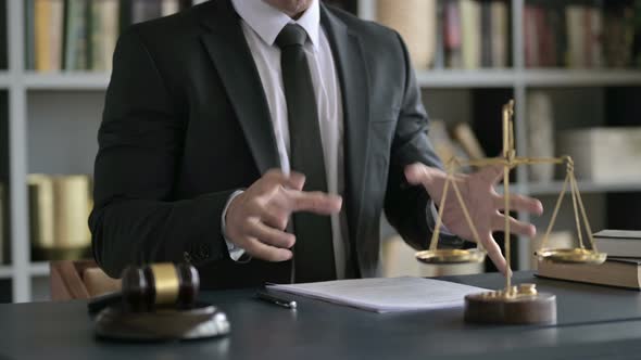 Close Up Shoot of Upset Lawyer Hand Checking Document in Court Room alt