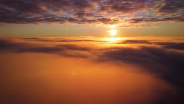 Cinematic footage of vibrant clouds in the sky during sunset