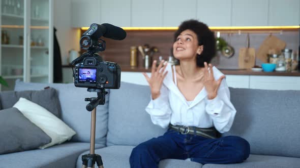 Soft Focus on a Tripodmounted Camera Records a Blurry Outoffocus Video of a Gorgeous African alt