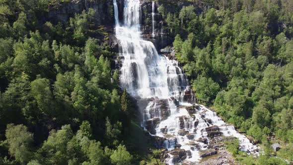 Famous Tvindefossen aerial approaching with view from top to bottom - Voss Norway alt