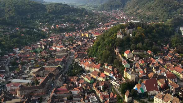 Aerial drone view of the Historic Centre of Sighisoara, Romania. Old buildings alt