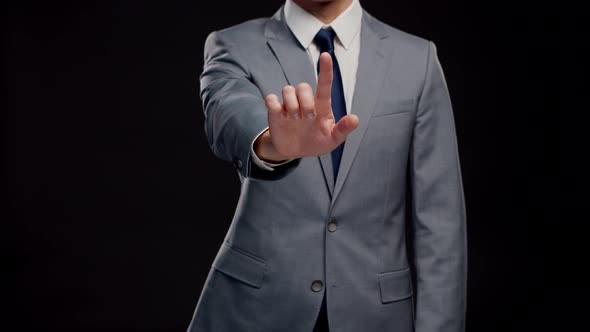 Studio portrait of successful and smart businessman in suit and tie. alt