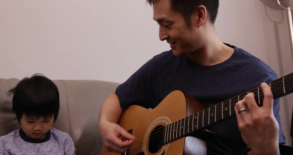 Family enjoying time relaxing together at home alt
