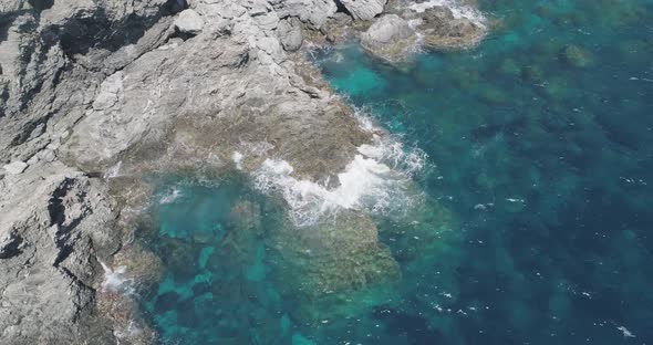 A View From Above of the Ocean Waves Crushing on the Rocks in South of France