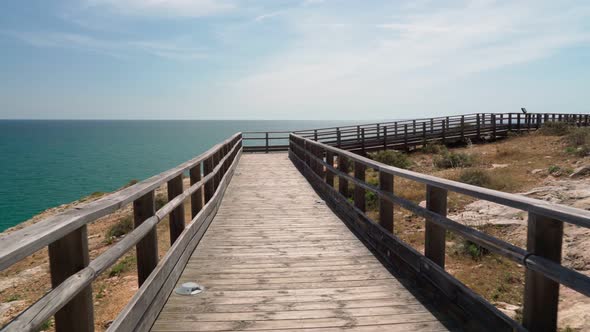 Wonderful View of the Portuguese Coast of Carvoeiro in Summer Walking Along the Wooden Paths alt