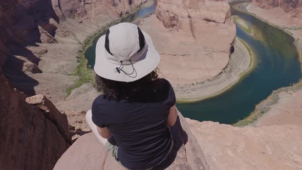 Adventurous Caucasian Woman at Horseshoe Bend in Page Arizona United States alt