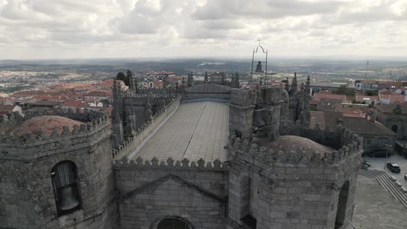 Drone view of Guarda Cathedral showing the clock tower and roof