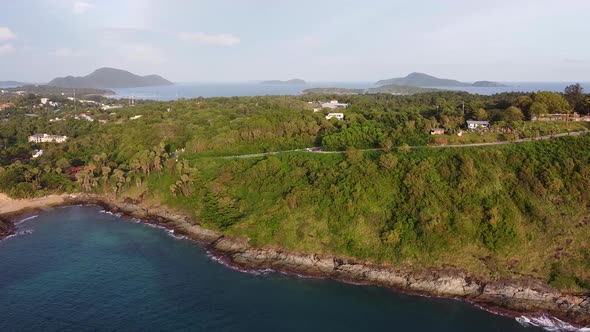 Coastline Flyover Tropical Island Reveal: Phuket, Thailand; Promthep Cape alt