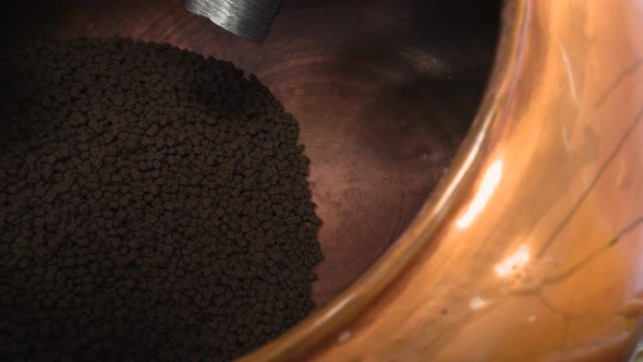 Chocolates on Production. Large Capacity for Mixing Sweets. Chocolate Factory. The Gradual alt